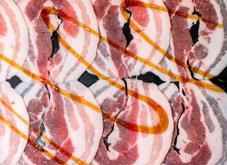 Slide raw beef for Yakiniku. Thin piece beef for Shabu hotpot japanese food style. Close up fresh...