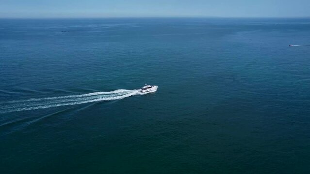 following the ship ocean ocean waves blue drone footage 2.7k