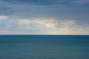 Naklejka na ściany i meble clouds over the black sea