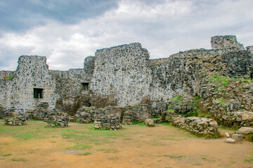 Fototapeta na wymiar ruins of castle in the field