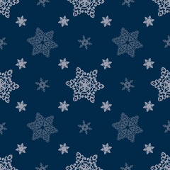 Snowflakes on a blue background, patern