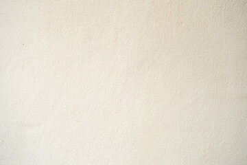 White concrete wall surface with yellow stains.