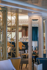 Elegant Art Deco interior design furnishing bar lounge area onboard ocean liner cruiseship cruise...