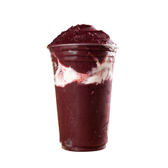 Brazilian Frozen A&ccedil;ai Berry Ice Cream Smoothie in plastic cup. On a wooden desk and a gray summer background. Front view for menu and social media