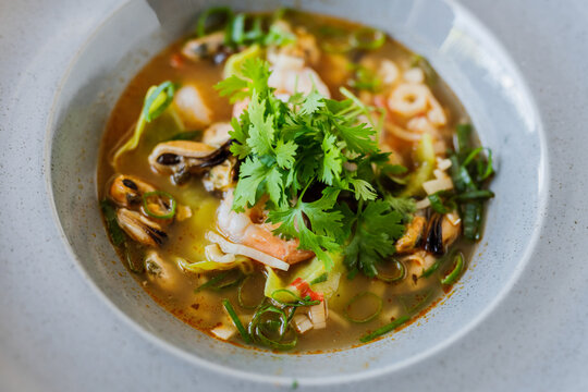 Soup Seefood With Shitake And Onion And Gyoza