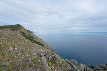 Fototapeta na wymiar Beautiful summer landscape coastal and clear blue water of Baikal Lake