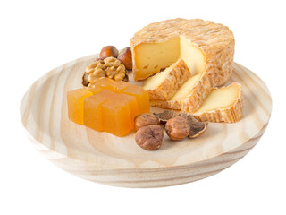 Soft washed-rind cheese, hazelnuts, walnut and marmalade on the textured wooden board isolated transparent png
