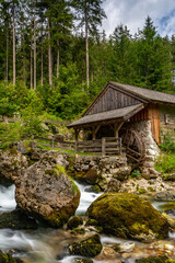 Fototapeta na wymiar Long Exposure of Mill with Stream near Gollinger Waterfall, Austria, Europe