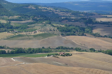 Naklejka premium The beautiful countryside and town of Montepulciano in Tuscany on a bright summer day