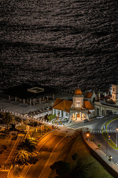 View from the 38th floor of the Havana building in the city of Mar del Plata. Night view of "El Torreon del Monje" with reflection of the moon.