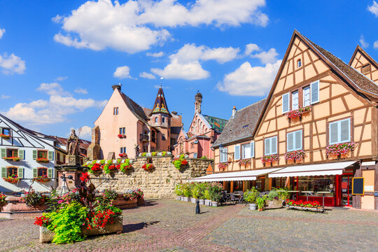 Eguisheim, France. Colorful half-timbered houses in Castle Square, Alsace.