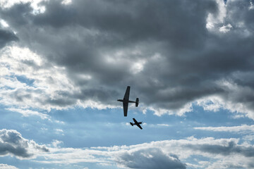 Fighter aircrafts on the sky with clouds