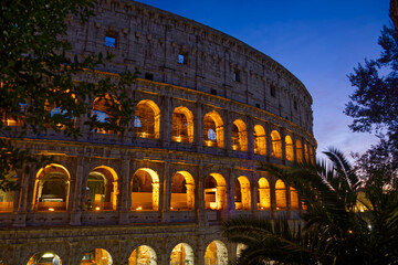 Naklejka premium The Colosseum in Rome Italy during sunset in the summer.