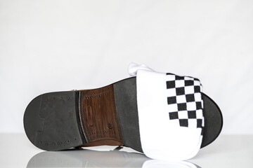 Men's autumn boots made of brown genuine leather isolated on a white background.