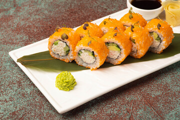 Sushi, rolls, sushi with fish on a textured background, side view