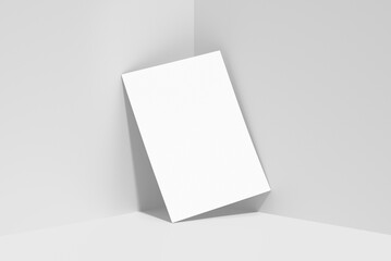 Fototapeta premium Blank a4 poster mockup at the corner of studio