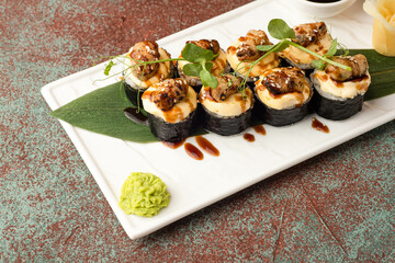 Sushi, rolls, sushi with fish on a textured background, side view