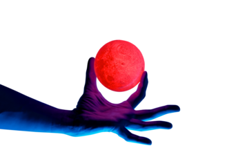 Human migician hand holding red illuminated sphere. Surrealistic collage element, contemporary art for design, posters and banners. Neon purple light. Pop fantasy style