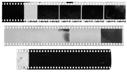 Old, used, dusty and scratched celluloid film strips on transparent background