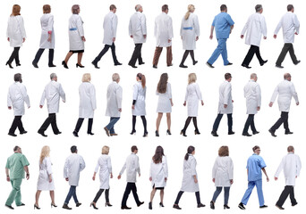 group of doctors in motion isolated on white