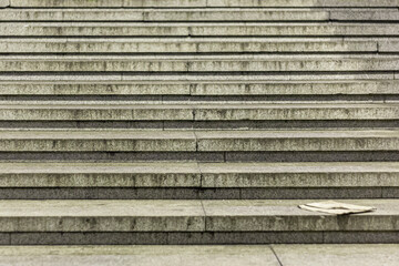 Staircase in the city. Steps as an architectural element. The texture of the tiles.