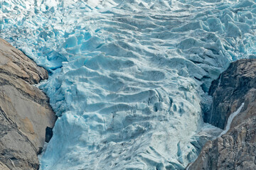 Melting ice mountain landscape, Norway. Briksdal glacier in Jostedalsbreen national park.