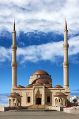 Fototapeta na wymiar Mosque building with minarets in Muscat, Oman