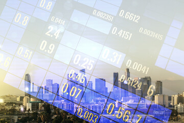 Double exposure of abstract creative statistics data hologram on Los Angeles office buildings background, analytics and forecasting concept