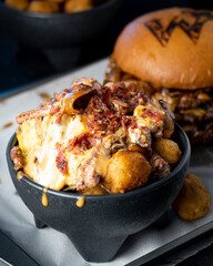 snack of bacon, meat and potato balls fried. 