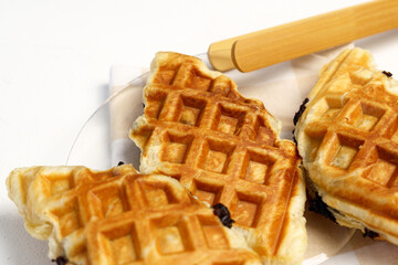 Croffles. Croissant dough is molded using a waffle mold. Flat lay