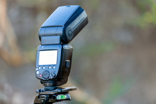 A speedlite flash on the field