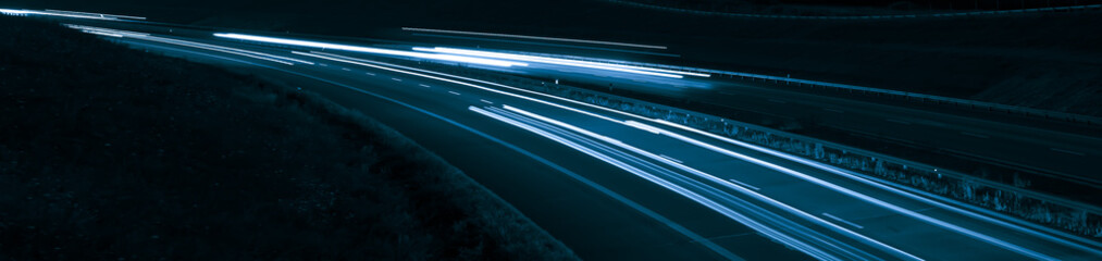 blue car lights at night. long exposure