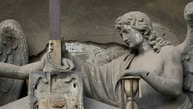Old angel statues in ancient cemetery