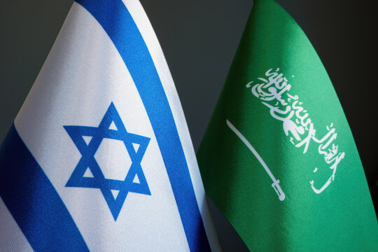 Small flags of Israel and Saudi Arabia.
