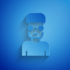 Paper cut Nerd geek icon isolated on blue background. Paper art style. Vector
