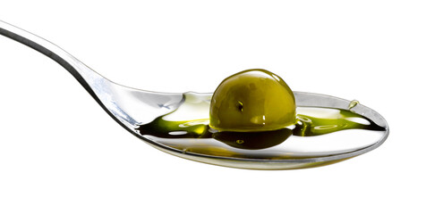 organic olive oil poured into the spoon