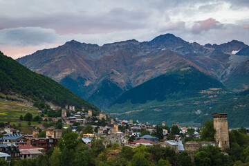 Mestia landscape at sunset with Svan towers, mountains in Svaneti region, Georgia. Mestia in Svaneti region is a popular sightseeing destination for tourists in Georgia.