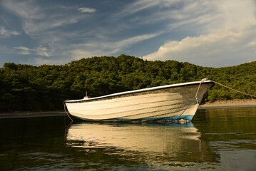 Naklejka na ściany i meble fishing boat in the bay on the island of Mljet