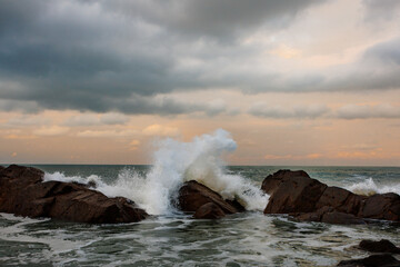 waves crashing on rocks