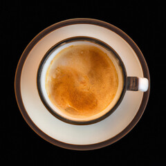 Cup of coffee on black background. Top view from above