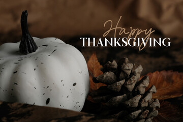 Rustic Happy Thanksgiving background with white pumpkin for fall season holiday.
