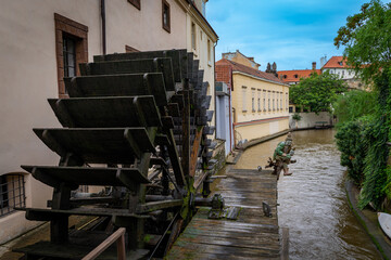 The Čertovka (Devil's Canal), sometimes also called Little Prague Venice with a wooden mills on it. 