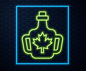Fototapeta premium Glowing neon line Bottle of maple syrup icon isolated on brick wall background. Vector