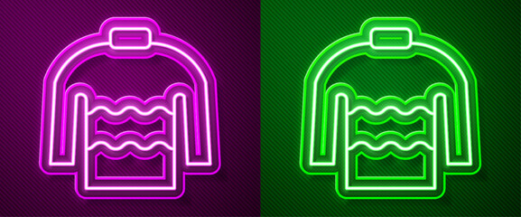Glowing neon line Sweater icon isolated on purple and green background. Pullover icon. Vector