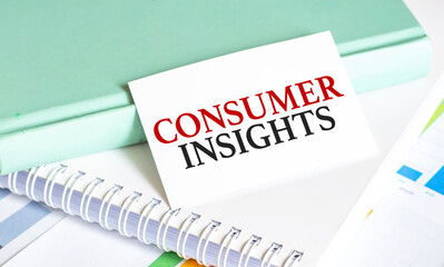 card with text Consumer insights on charts and notepads