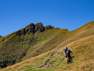 Obraz premium Cycling scene in the alps of Intelvi Valley
