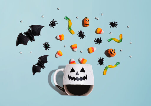 Halloween theme with ghost mug - overhead view flat lay