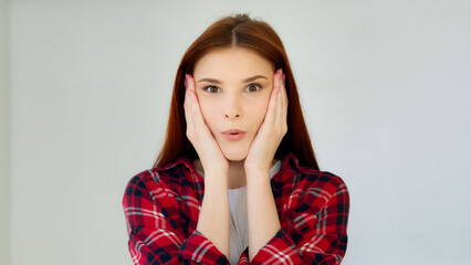 Surprised ginger girl student teenager feel good shock admiration female face excited winner says...