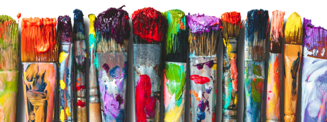 Row of artist paintbrushes closeup. Artistic brushes smeared with paints, isolated.