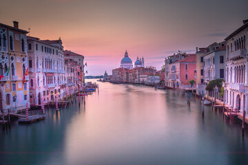 Fototapeta na wymiar Grand Canal in Venice at sunrise, with Santa Maria della Salute Basilica, Italy